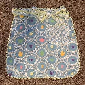 Cute waist apron with tea cups and tea pots.